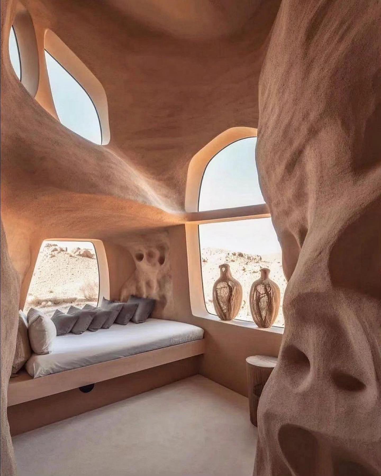 The meme is a humorous image of a person's living room, but it's not actually a living room - it's a cave. The text on the image reads, "When you realize your cave is actually a house."